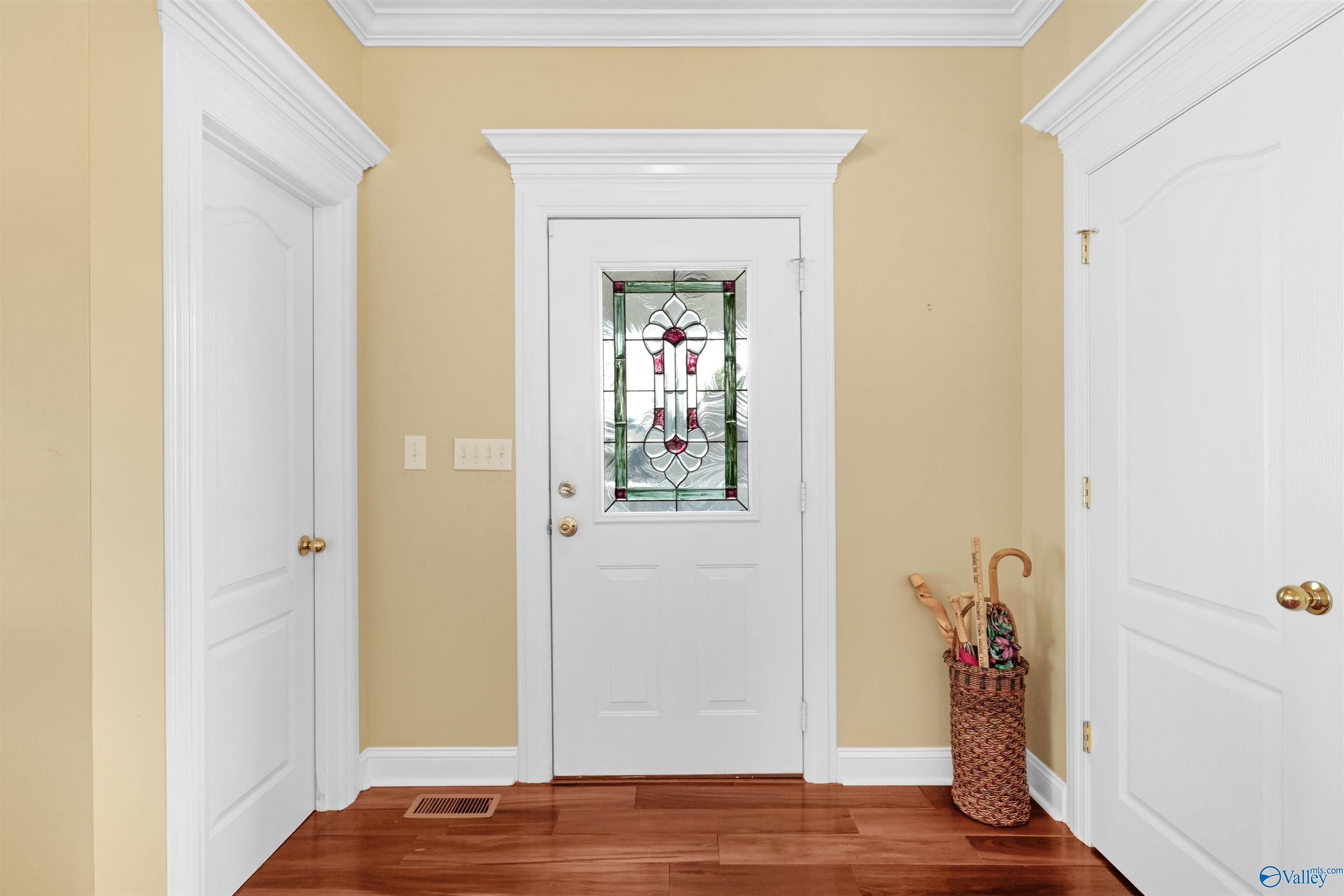 Image 4: Front door.... spacious coat closet and room to turn around!
