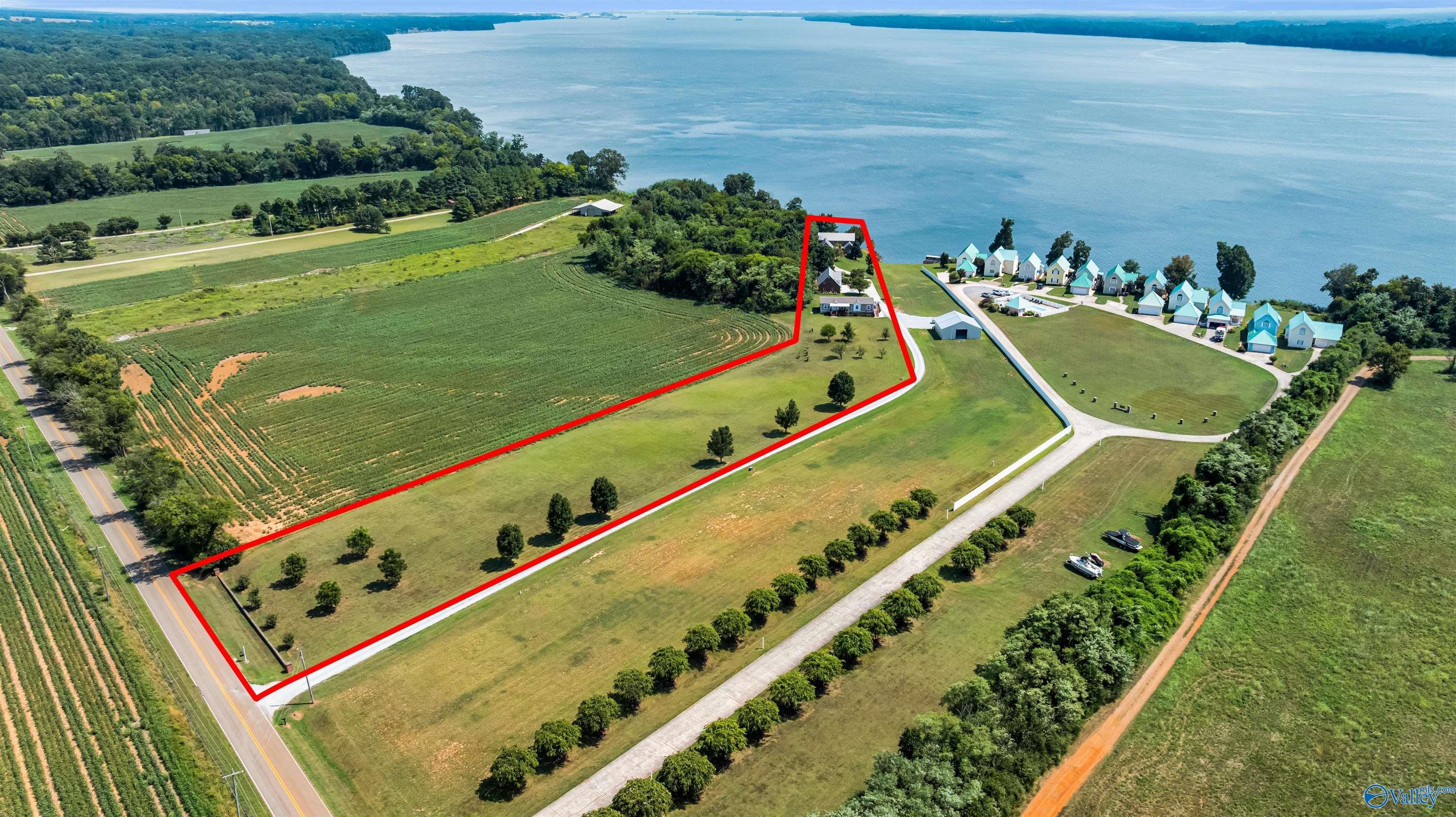 Image 3: Depicts 3.49 acres from Snake road to Tennessee River. Lines are approximate and not to be used in place of a survey.