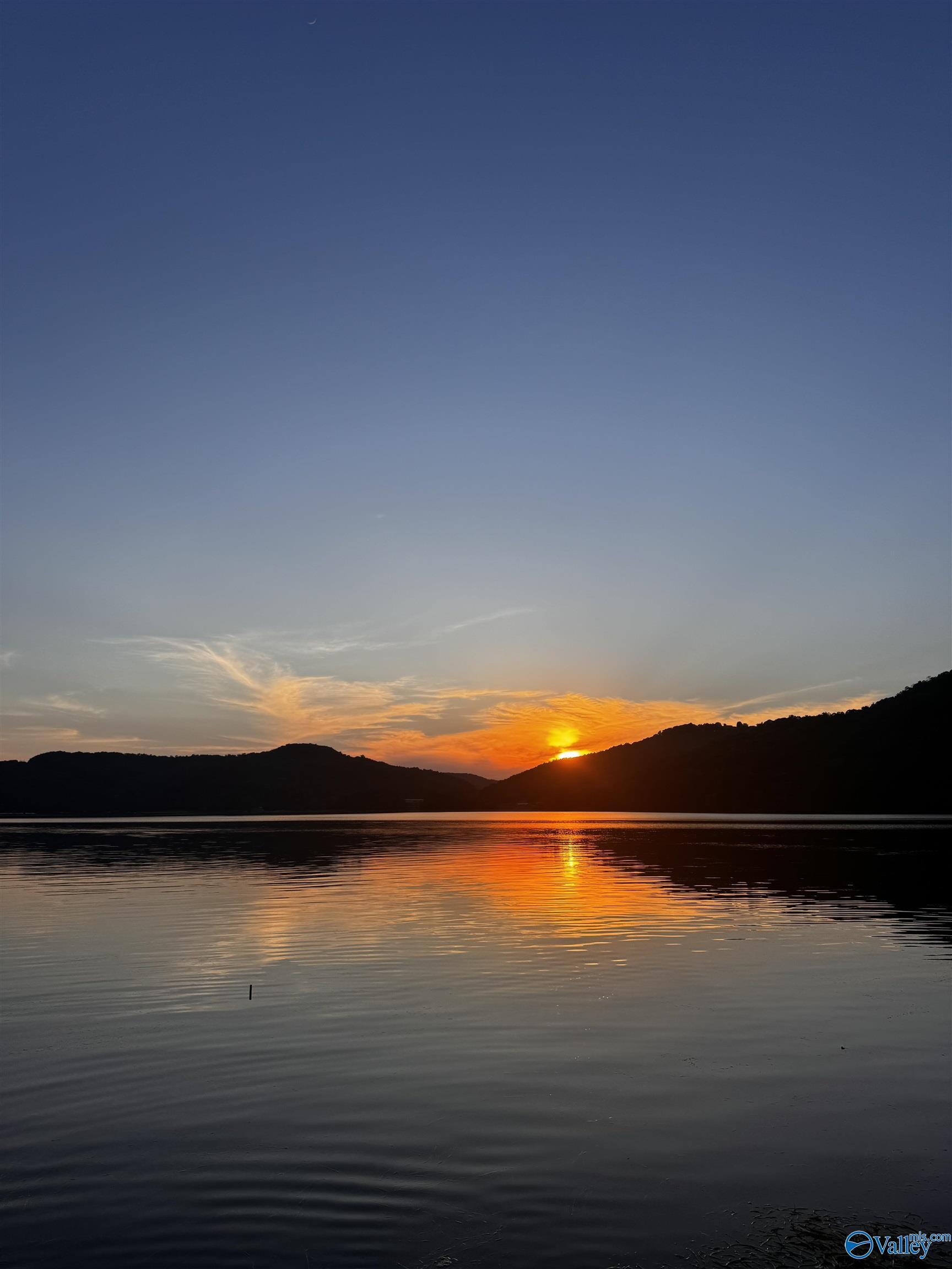 Image 3: Just one of many beautiful sunsets from the boathouse