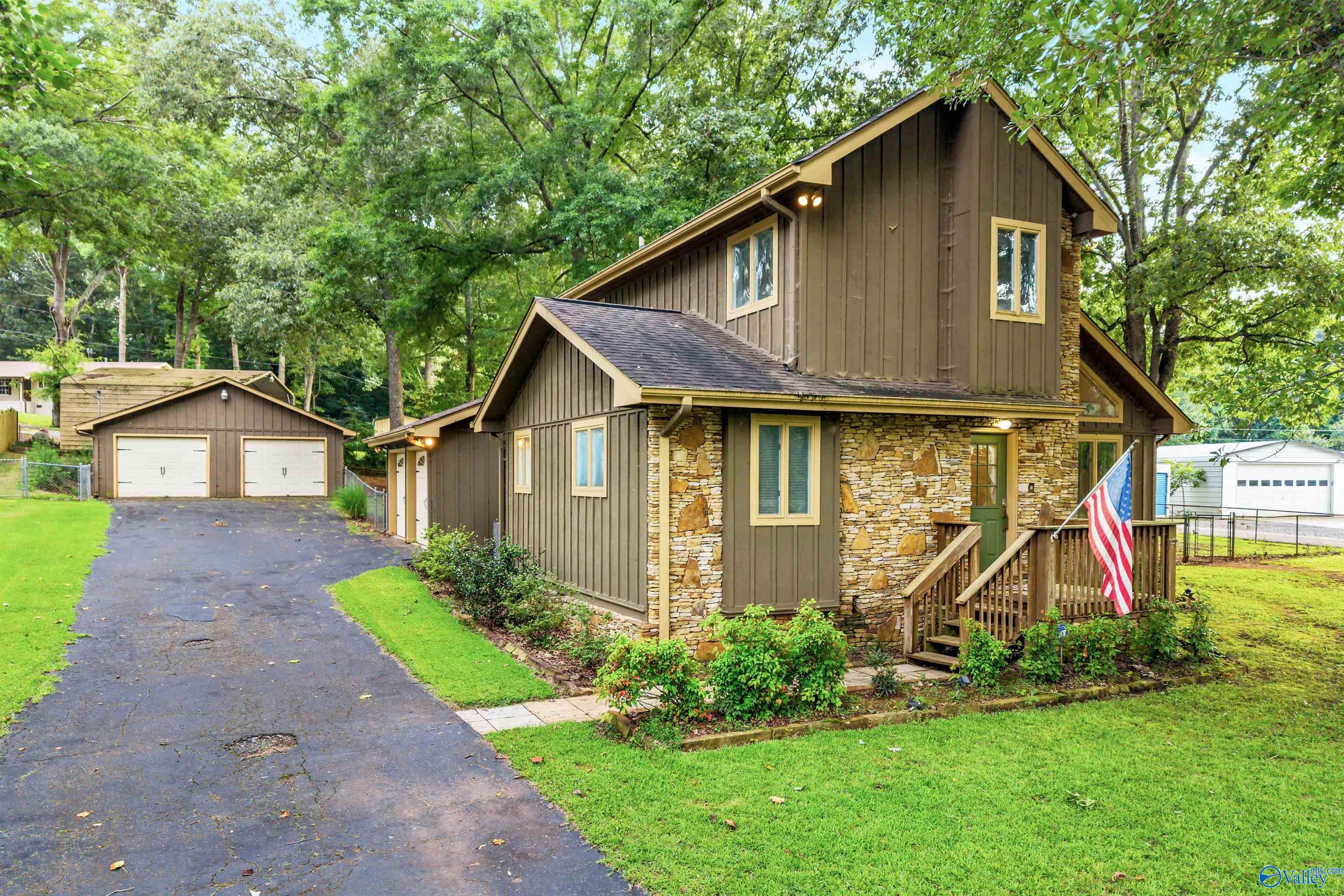 Image 2: Showing the 2 garages ... detached has the 220 amp  and both have ample storage  for all your lake toys !