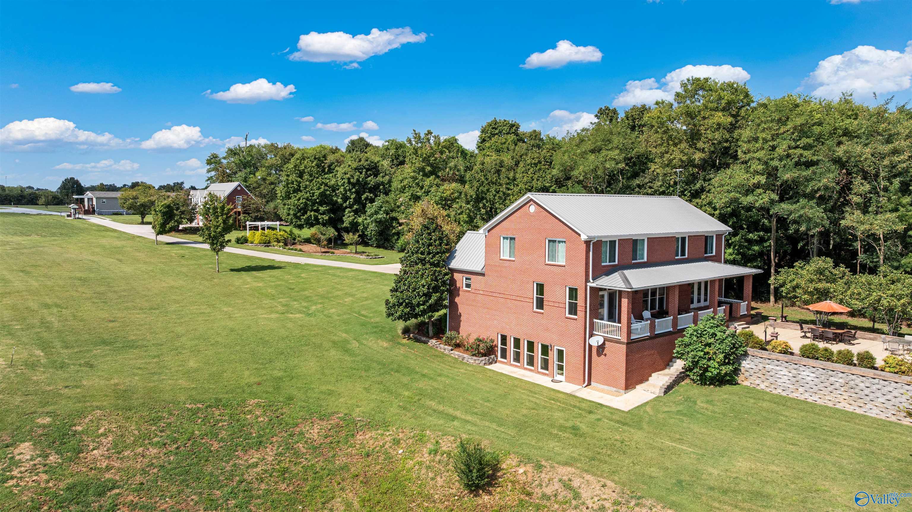 Image 3: Great vantage point from the river showing all three properties and how tucked off the main road you are!