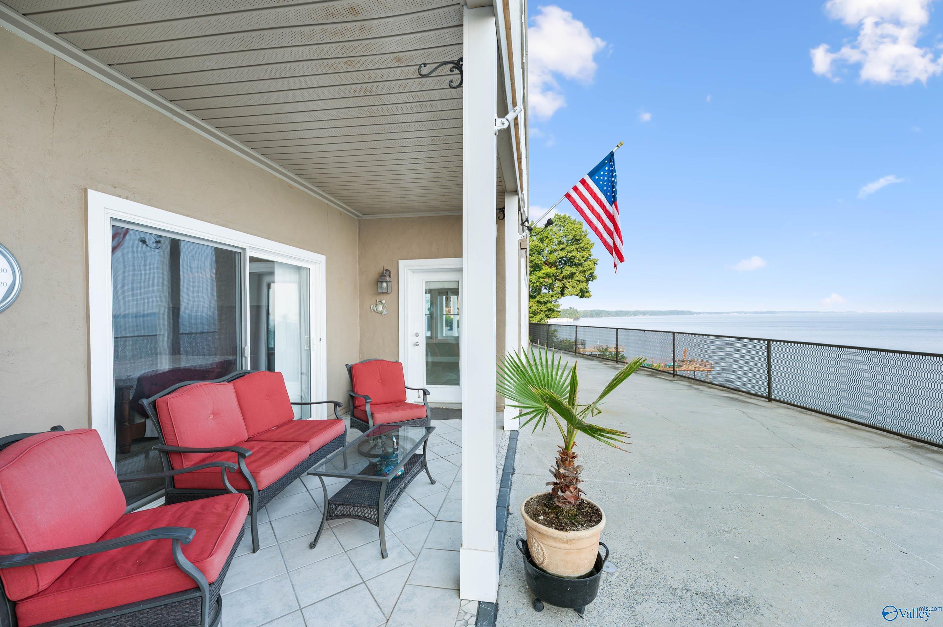 Image 1: Patio and terrace overlooking the TN River