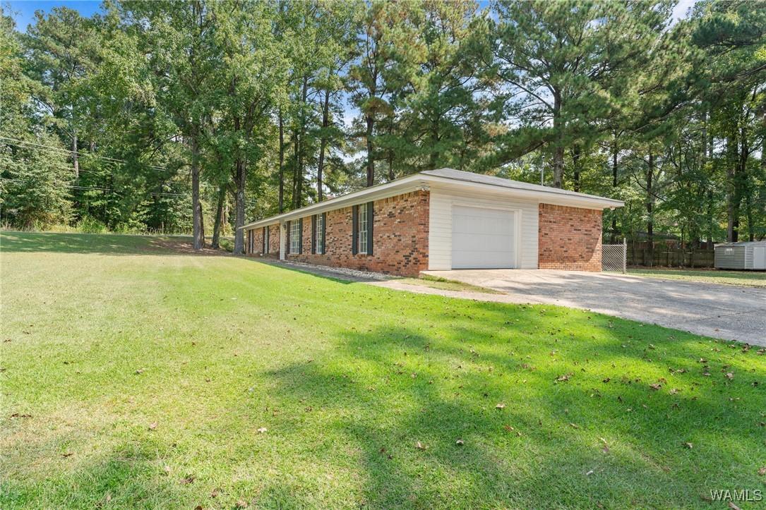 Image 3: View of home from Leland Drive.