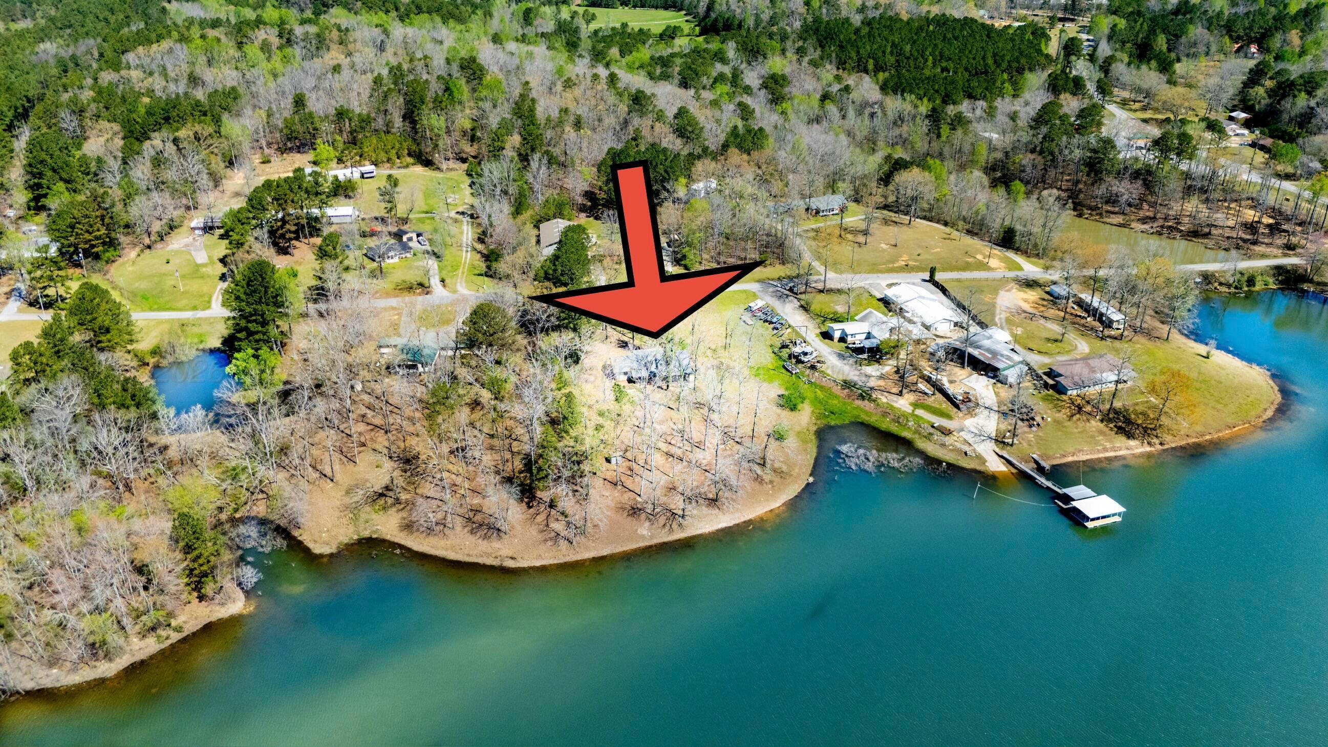 Image 1: Lake view from the back of the property