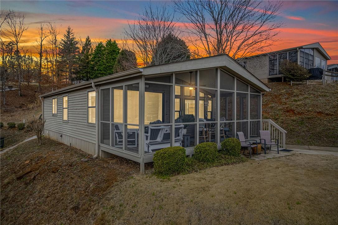 Image 2: This captivating residence boasts a comfortable sc