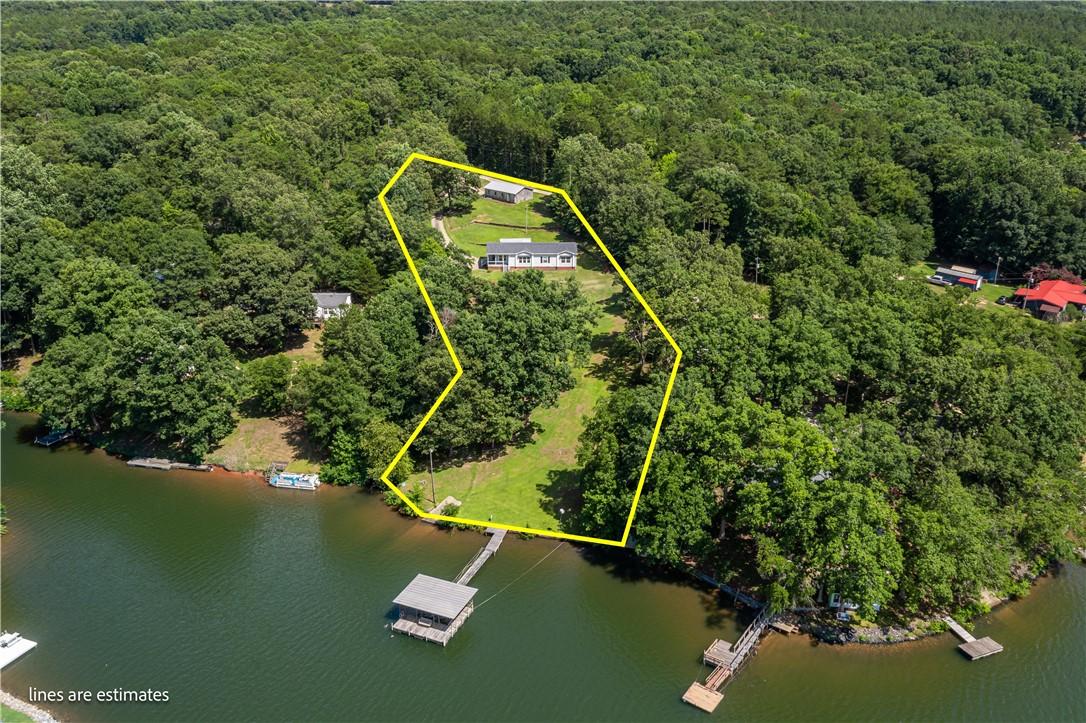 Image 2: Discover a private retreat with lake access and a