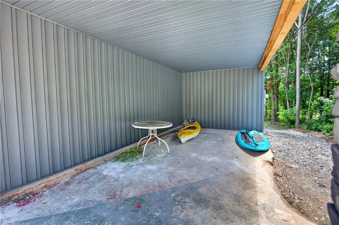 Image 3: A utilitarian covered space offering shelter, feat