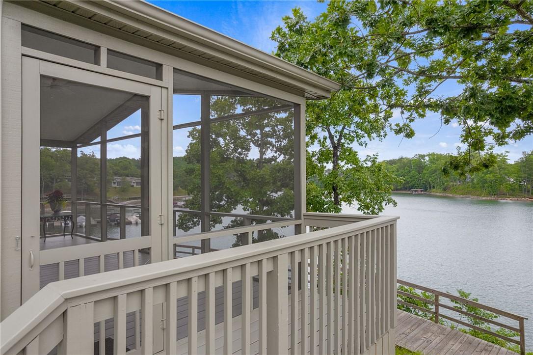 Image 1: Lakeside living defines the front door and the scr
