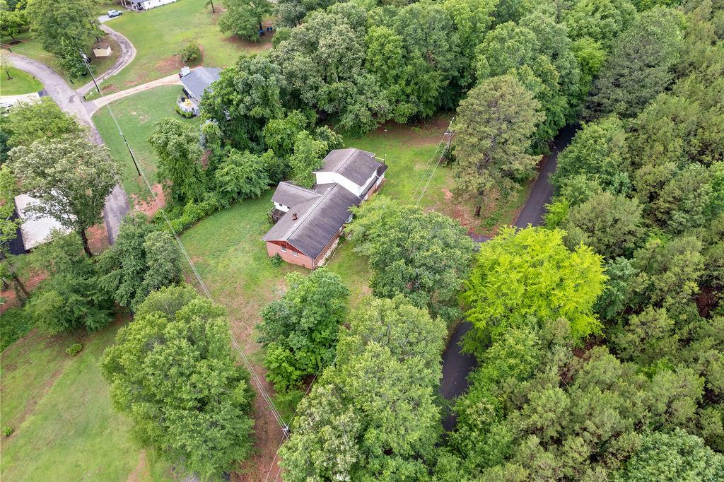 Image 4: Discover a private woodland retreat featuring an i