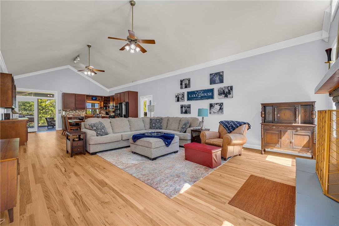 Image 4: Hardwood flooring extends throughout this generous
