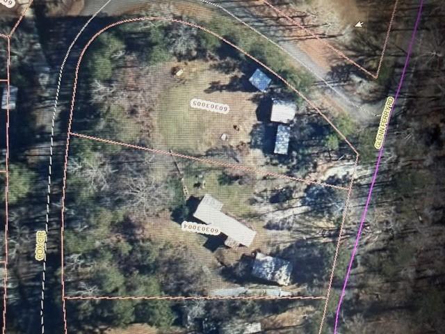Image 1: An aerial perspective reveals the expansive lot wi