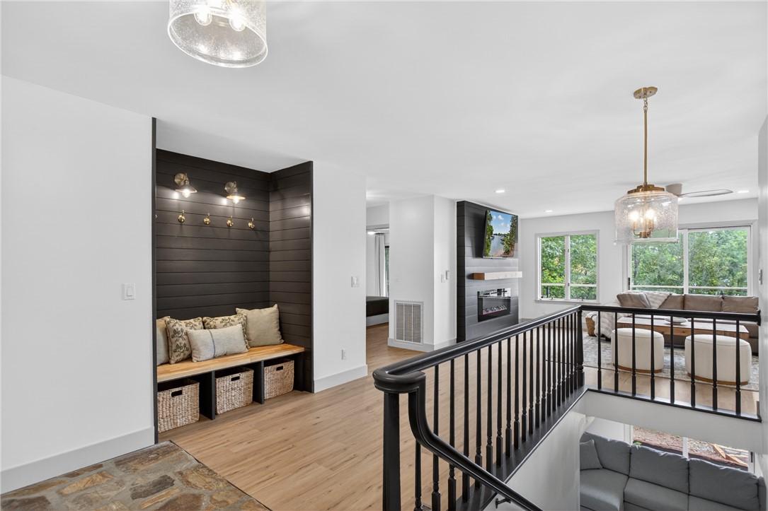 Image 4: Step into a home with a built-in mudroom bench and