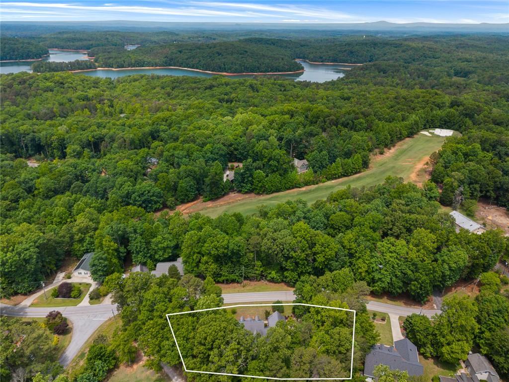 Image 2: Home sits on Hole #5 and close proximity to Lake H