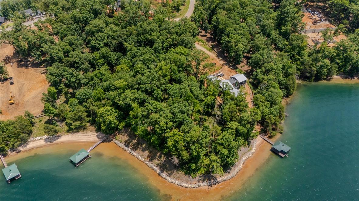 Image 3: A tranquil lakefront property featuring a private