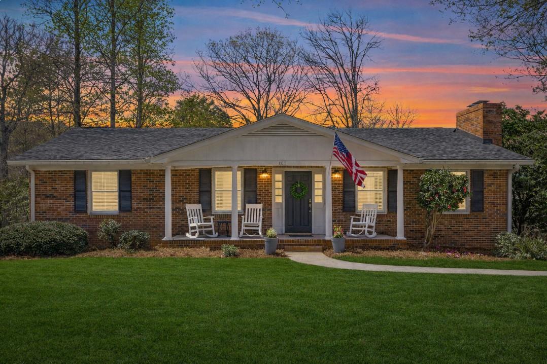 Image 2: Virtual Sky and grass. This charming brick home of