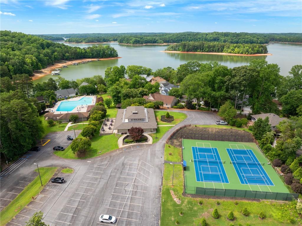 Image 4: Lakeside community with recreational amenities, in