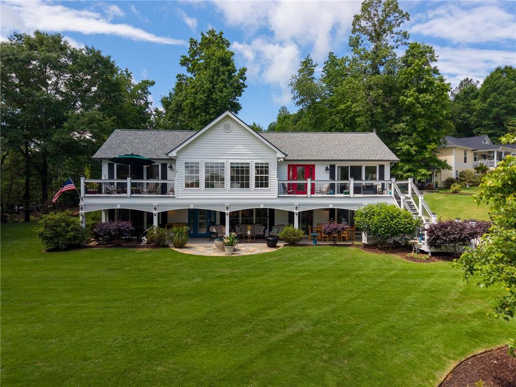 Image 3: This charming residence offers multiple levels of