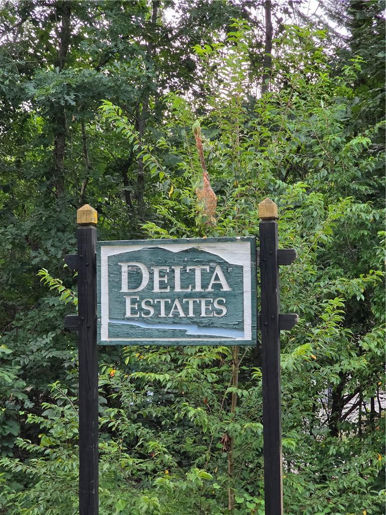 Image 1: The welcoming entrance sign to Delta Estates is fr