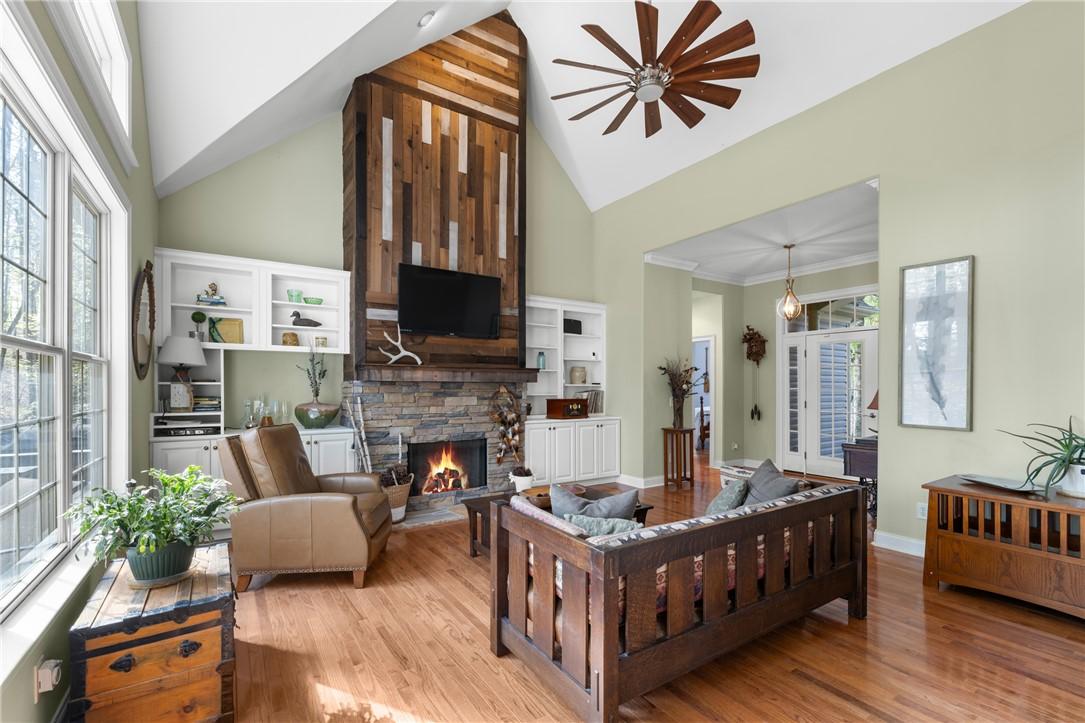 Image 4: This inviting living room showcases a striking fir
