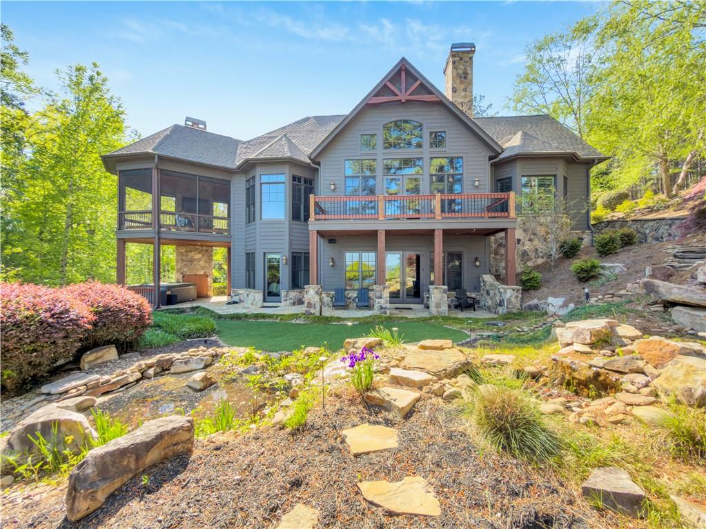 Image 2: This spacious house offers multiple outdoor areas