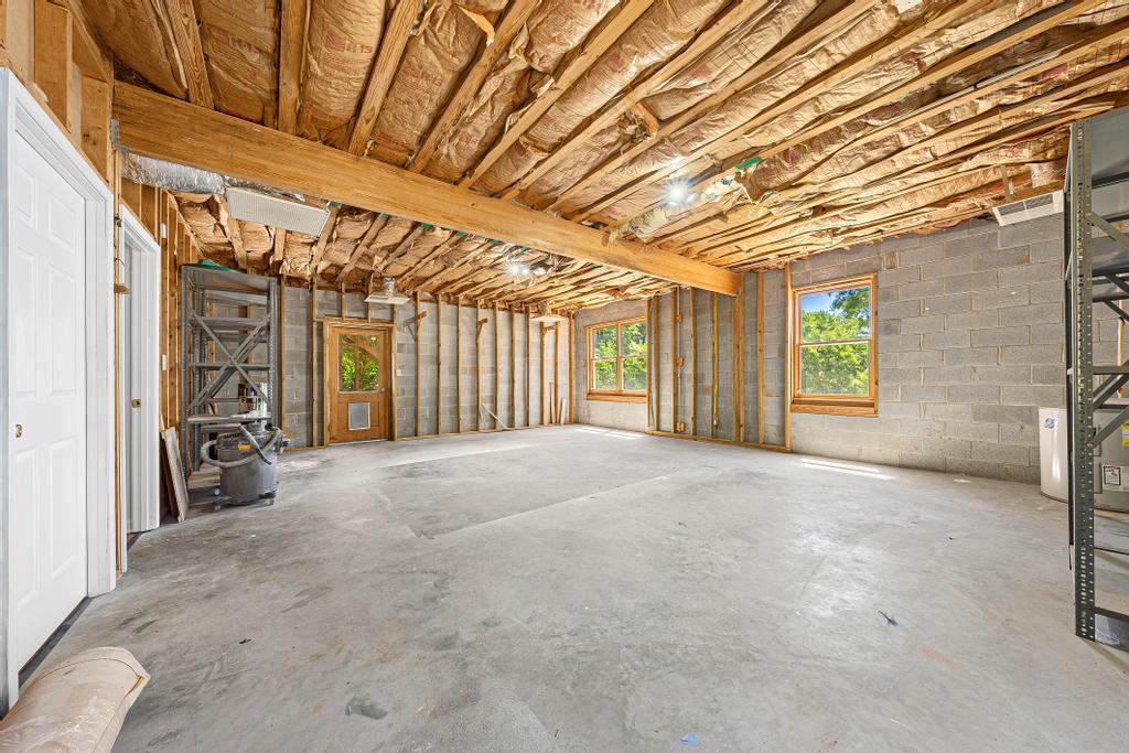 Image 4: A spacious partially finished basement complete wi