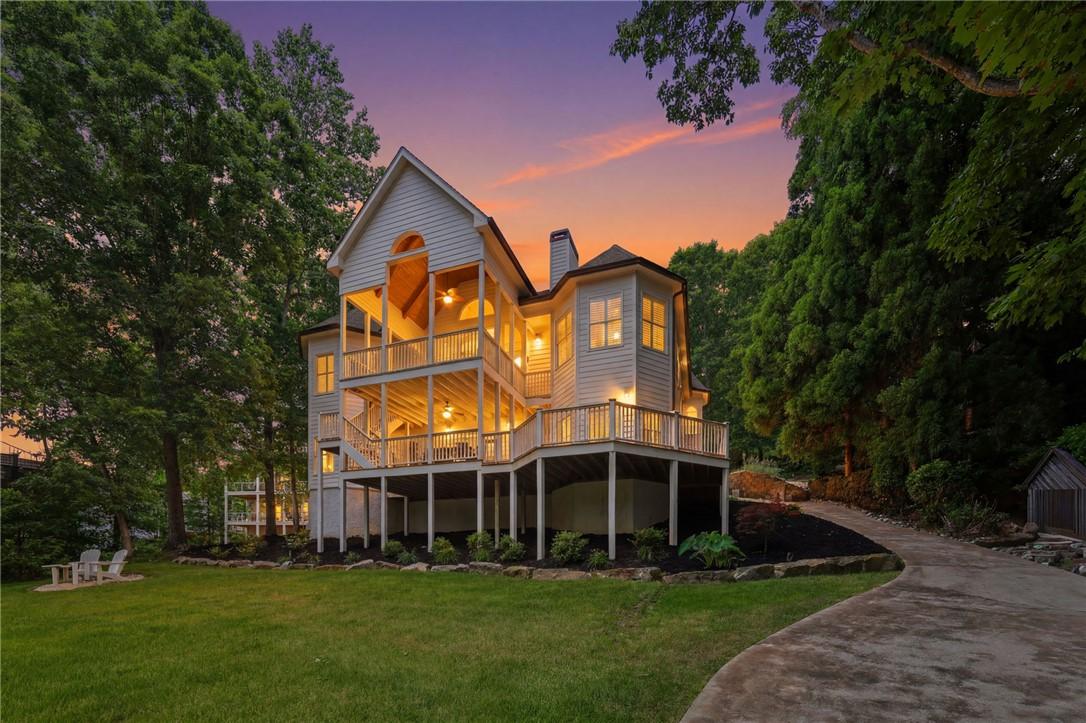 Image 2: This house features expansive outdoor living space