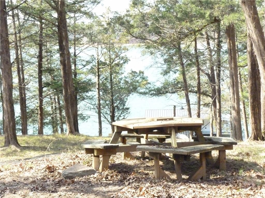 Image 2: Enjoy tranquil lake views from this private outdoo