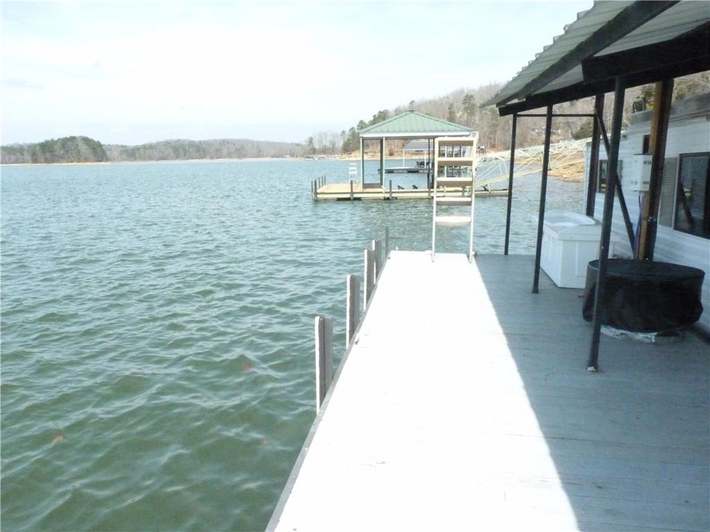 Image 4: This serene lakefront property includes a private
