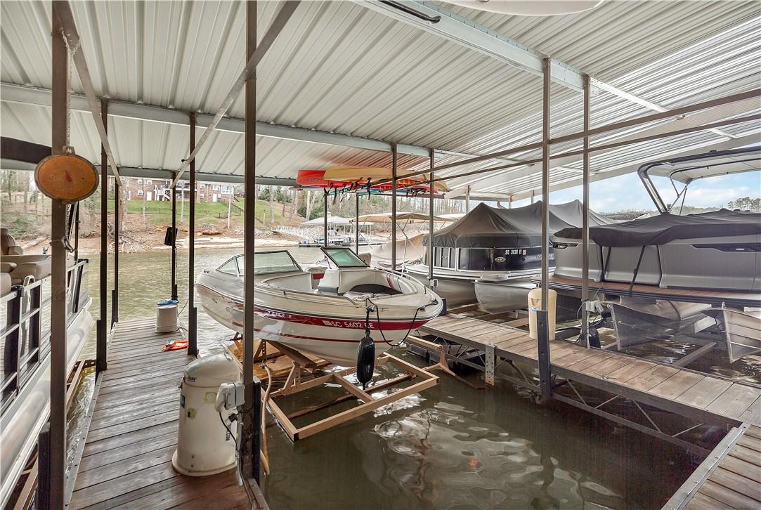 Image 2: This private dock with multiple boat slips provide