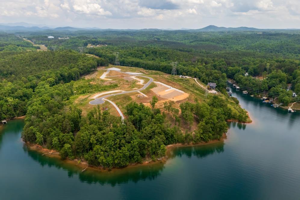 Image 4: A new lakeside development unfolds, offering prime