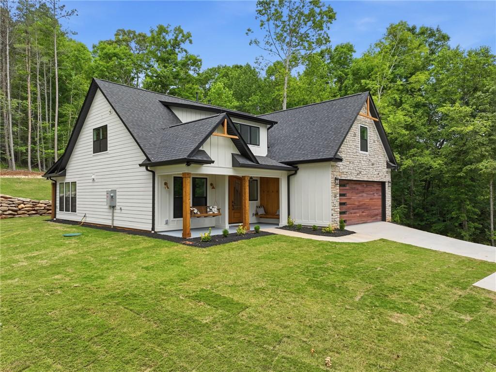 Image 2: This newly built home features a striking blend of