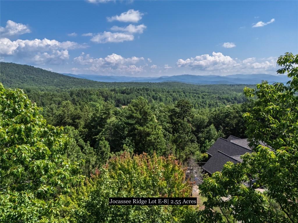 Image 1: A tranquil mountain vista offers a peaceful retrea