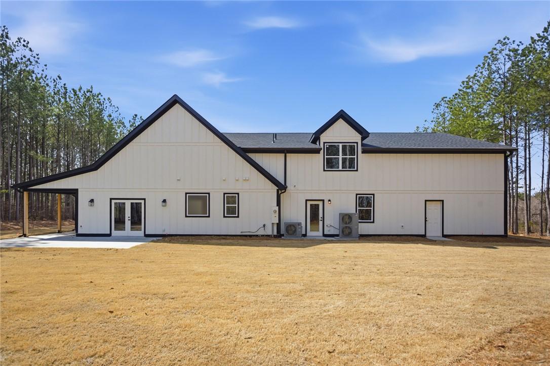 Image 2: This newly constructed home showcases a modern far