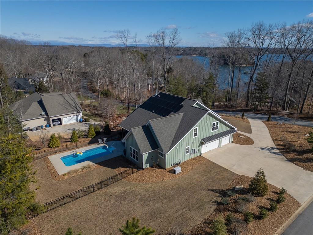 Image 2: This captivating residence boasts a private pool a