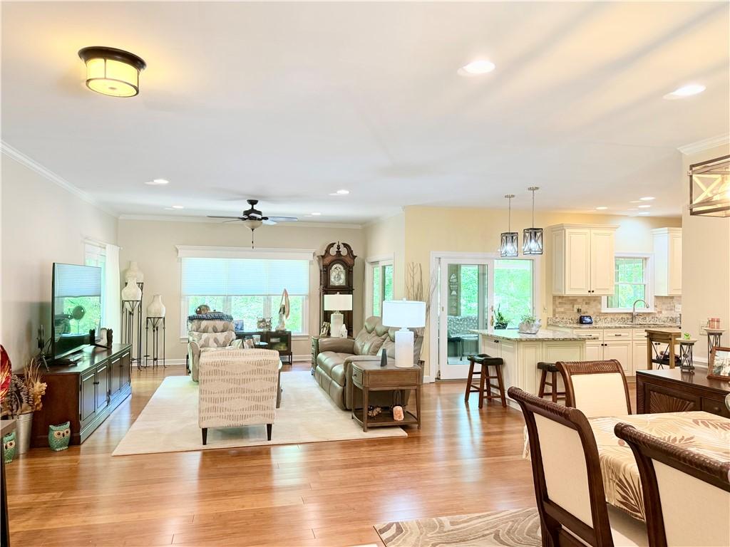 Image 2: This inviting space combines a comfortable living