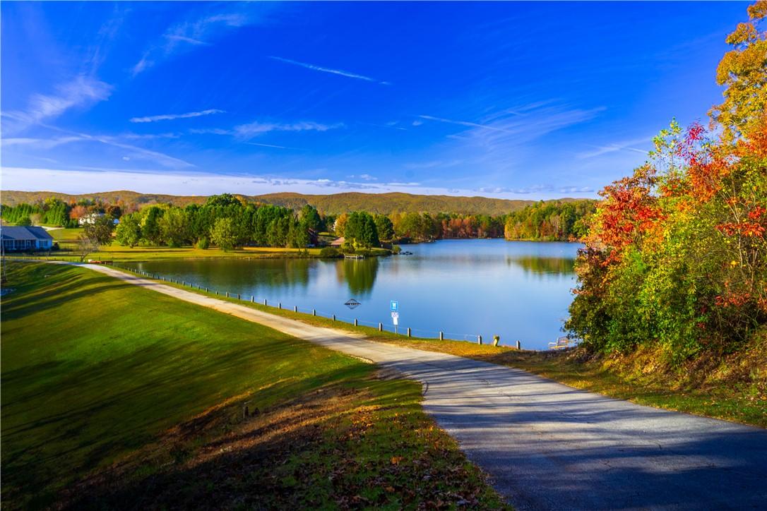 Image 2: This scenic lakefront property offers serene water