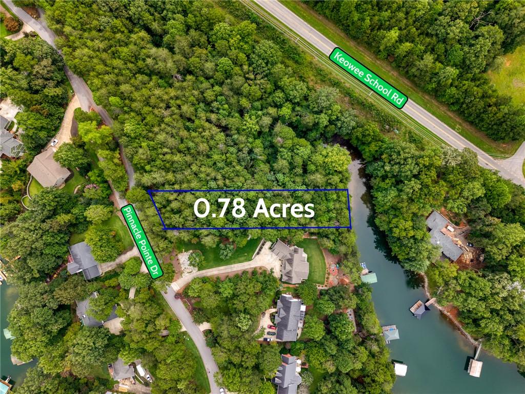 Image 2: This aerial view showcases a desirable lot with co