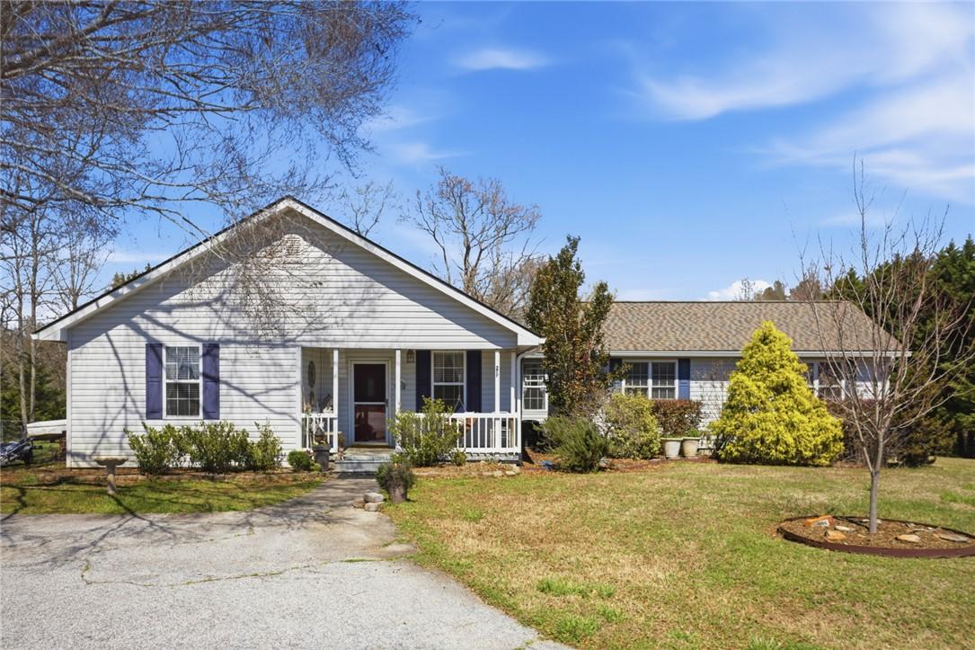 Image 2: This charming home offers classic appeal with a we