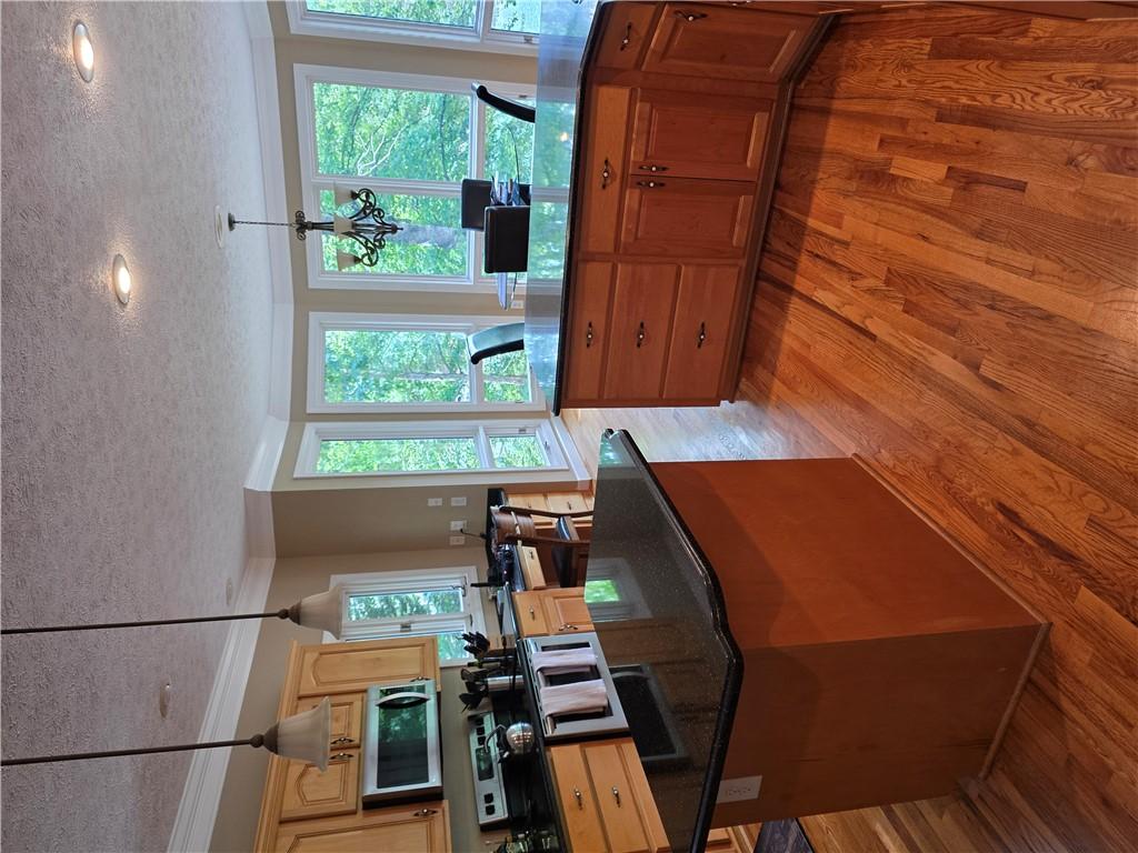 Image 2: This spacious kitchen offers ample countertop spac