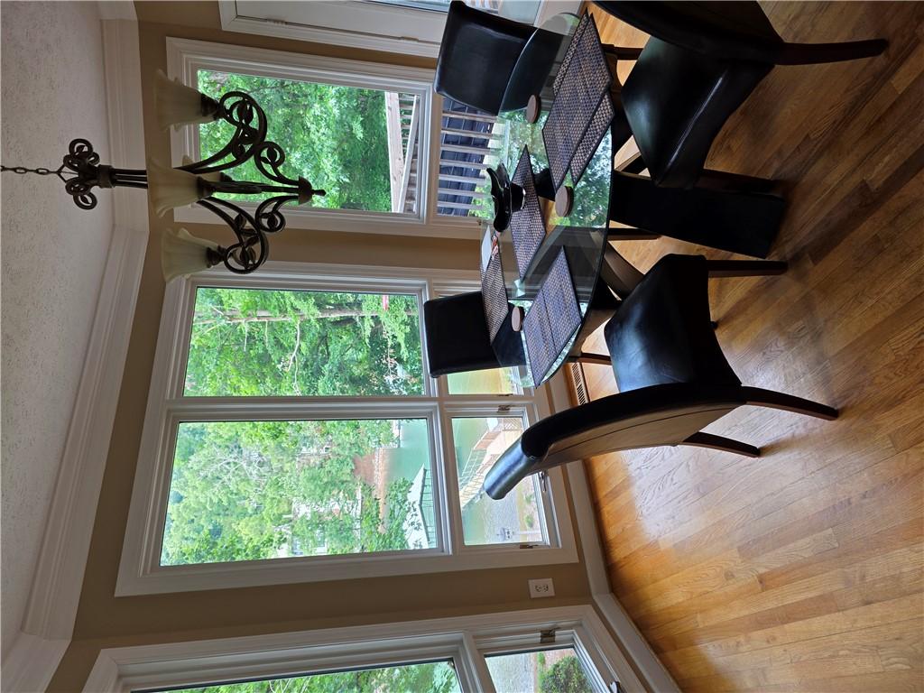 Image 4: This dining room offers captivating views of the s