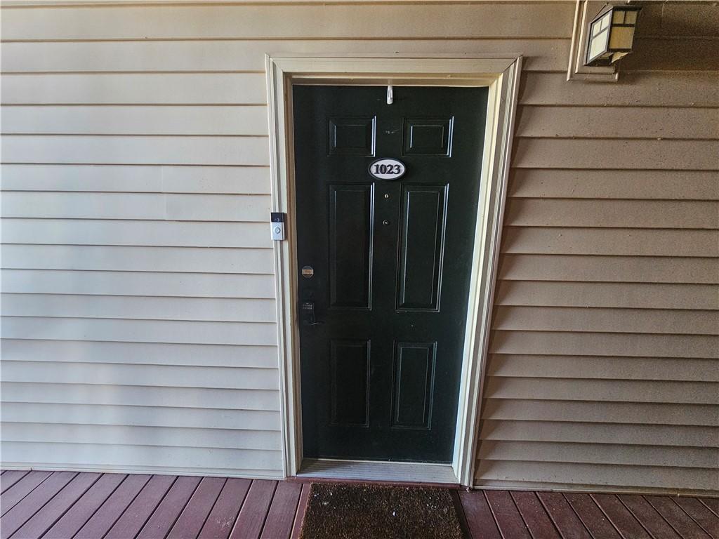 Image 3: Welcome home to this charming entry with inviting