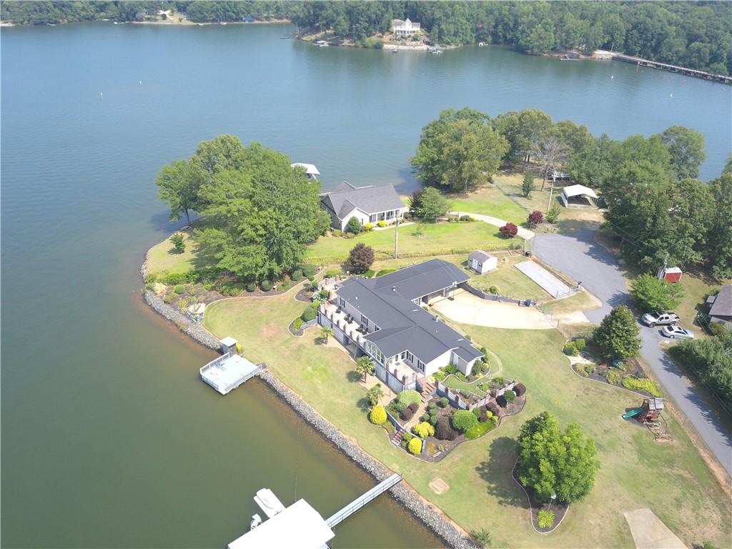 Image 3: This expansive lakefront property offers ample out