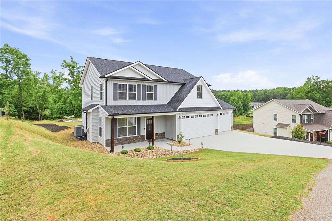 Image 2: This newly constructed home boasts charming archit
