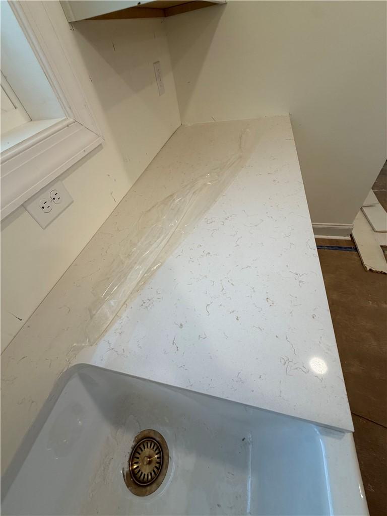 Image 4: A deep basin sink set within a newly installed cou