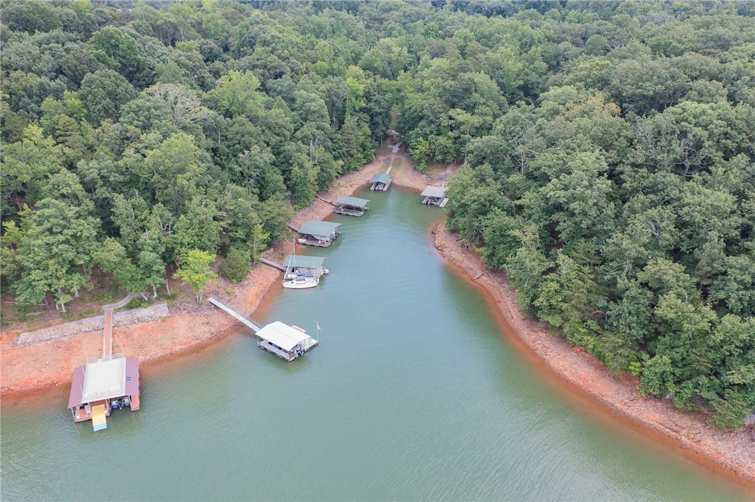 Image 4: Discover serene lakefront living with multiple pri