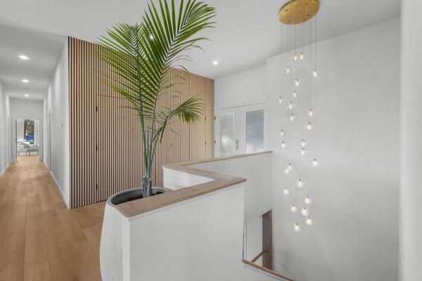 Image 4: Waterfall Chandelier Lights the open stairway in t