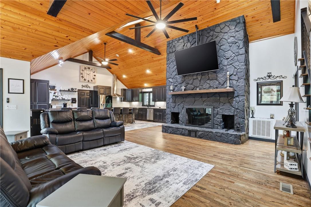 Image 4: This expansive great room seamlessly connects livi