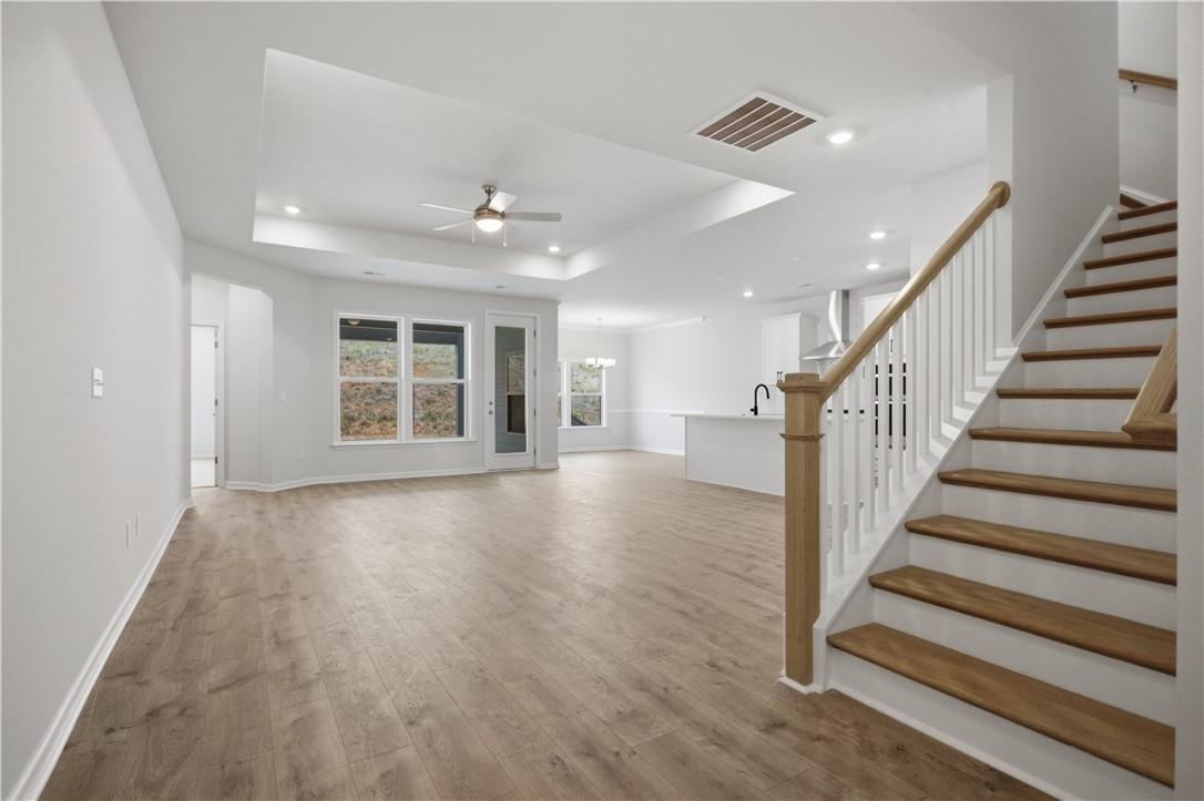 Image 4: An open concept design seamlessly connects the liv