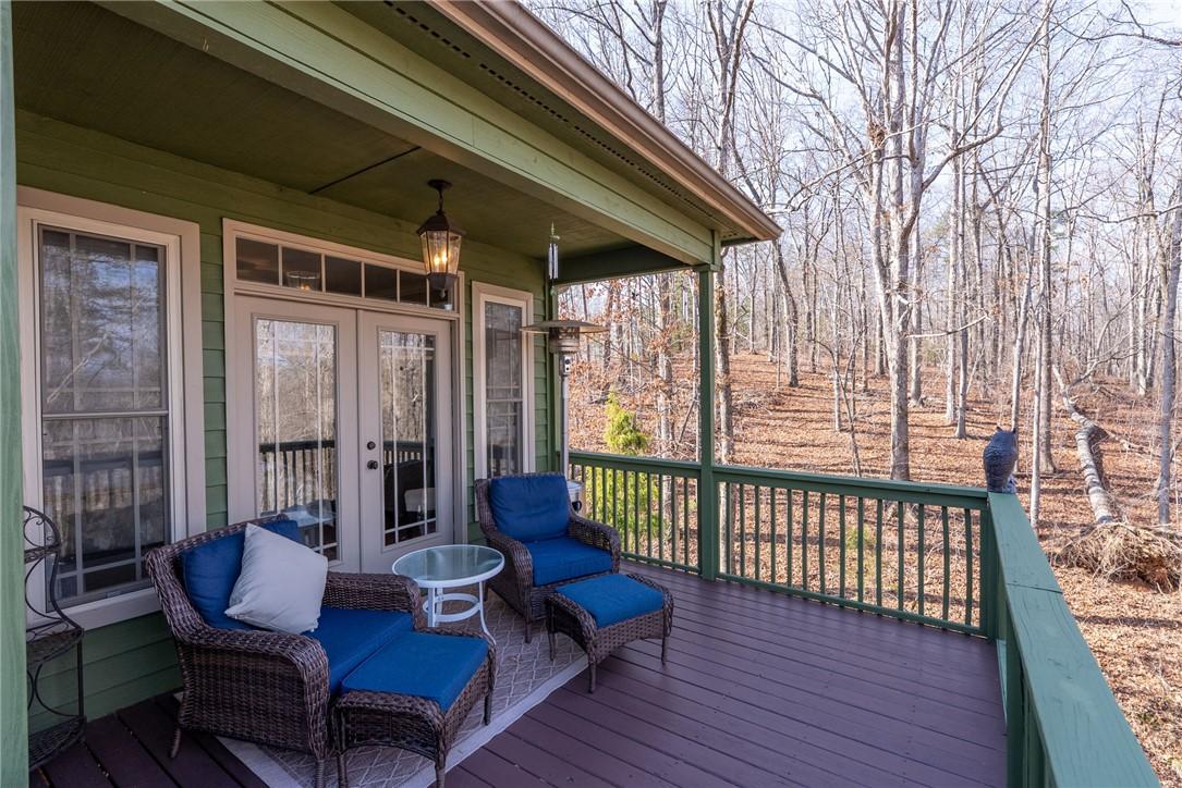 Image 2: This tranquil porch offers an idyllic woodland vie