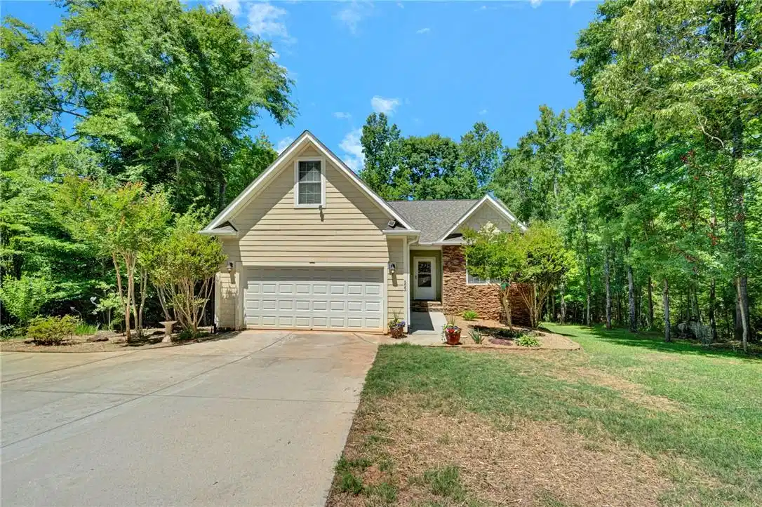 Image 1: This charming home offers a perfect blend of natur
